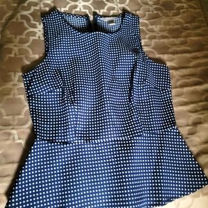 Peplum blue and white polka dot sleeveless blouse